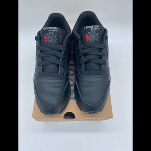 Gently worn boys Reebok Classic sneakers in Black